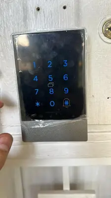 a close up of a remote control in a box at Exclusive Group Accomodation in Medellín