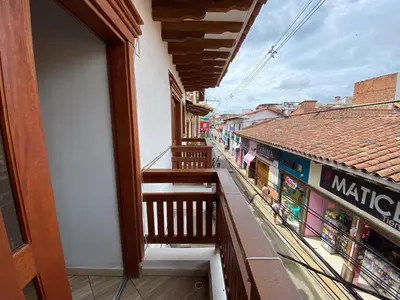 a balcony with a view of a street at Hotel La Bastida in Marinilla