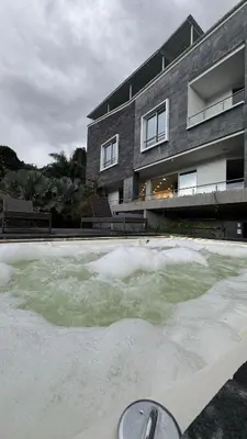 an ice rink in front of a building at Aurora Ecoliving Finca a 30 minutos de Medellín in Girardota
