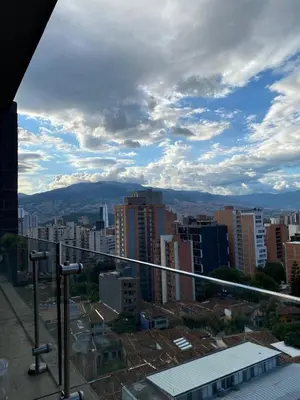 a view of a city from a building at Apartaestudio GoldensMary Buenos Aires in Medellín
