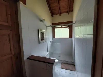 a bathroom with a shower and a toilet and a sink at Casa de Campo, La Suiza in La Ceja, Antioquia in La Ceja
