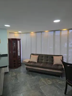 a living room with a couch in a room at Vancouver 201 in Villamaría