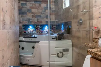 a bathroom with a shower and a sink at Coliving Belen Malibu in Medellín