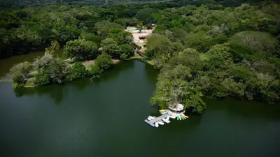 an aerial view of an island in a lake at Hostería Florida Tropical in Santa Fe de Antioquia