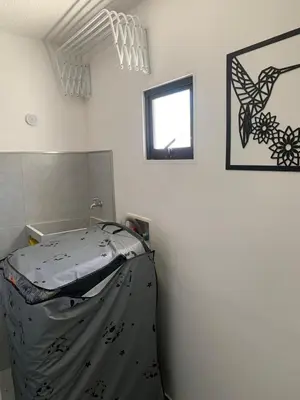 a room with a bed in the corner of a room at Natural charm in Medellín in Medellín