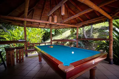 a pool table in a gazebo at Hermosa Casa y Cabañas en Barbosa, Antioquia in Barbosa