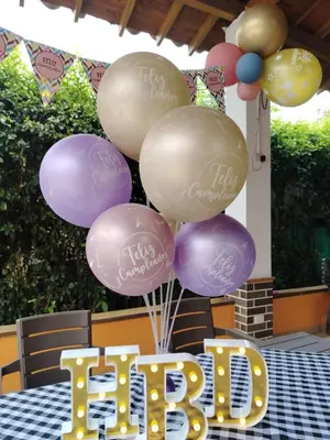 a bunch of balloons on a table with the word baby at Relax West Finca Hotel in Santa Fe de Antioquia