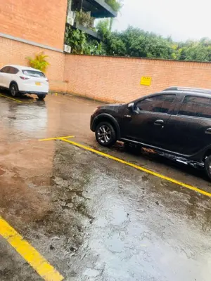 a black suv parked in a parking lot at Best location in El Poblado y Provenza in Medellín