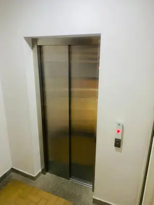 a elevator with a metal door in a building at Best location in El Poblado y Provenza in Medellín