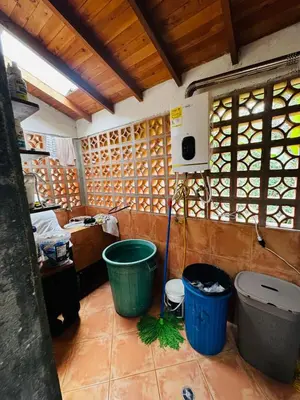 a room with two trash cans in a room at Magical farmhouse near Arví Park in Mazo