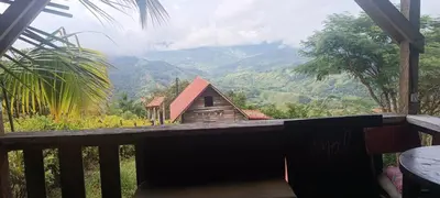 a small house on a balcony with a view of mountains at Mirador del valle in San Rafael
