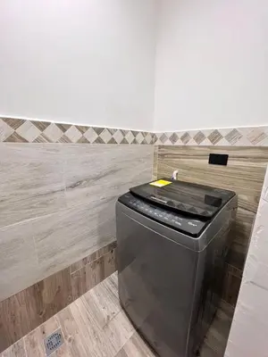 a trash can in a room with a wall at Meraki Urban Lofts in Quibdó