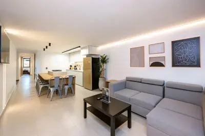 a living room with a couch and a table at M301 Poblado Apt close to lleras park jacuzzi AC in Medellín