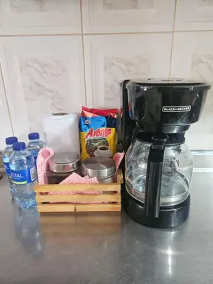 a coffee maker sitting on a counter with some food at Casa completa Comodidad-Ubicación Perfecta-CarmenV in Carmen de Viboral