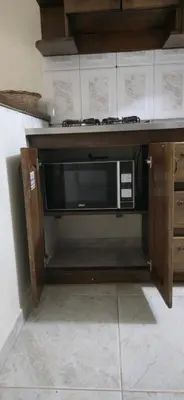 a microwave in a cabinet in a kitchen at Casa completa Comodidad-Ubicación Perfecta-CarmenV in Carmen de Viboral