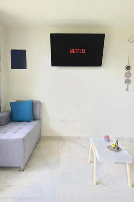 a living room with a couch and a table at Casa completa Comodidad-Ubicación Perfecta-CarmenV in Carmen de Viboral