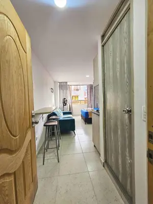 a room with a door leading to a living room at Ágape 301 in Itagüí