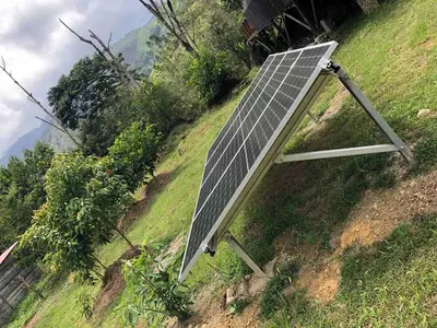 a solar panel sitting on top of a hill at Cabaña del rio, San Luis, Antioquia in San Luis
