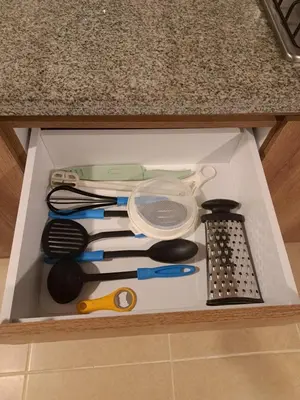 a drawer filled with kitchen utensils on a counter at Sector Turistico, Confort y Full Amoblado in Manizales