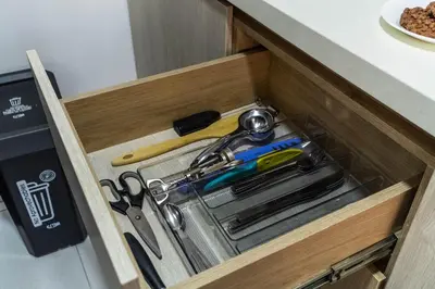 a drawer filled with cutting utensils in a kitchen at Cozy Spring Flat in Laureles in Medellín