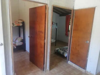 a room with a door and a room with a bedroom at Casa Arcolibri in San Rafael