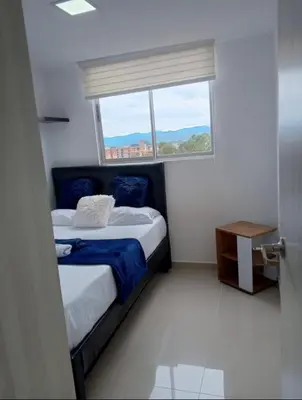 a bedroom with a bed and a window at Ap entero en Rionegro cerca Aiport JMC ,Int in Rionegro