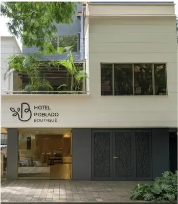 a building with a hotel podocod boutique at Hotel Poblado Boutique in Medellín
