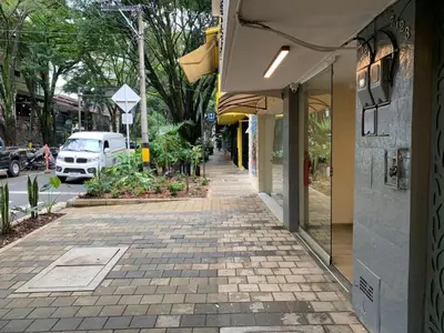 an empty sidewalk in front of a building at Hotel Poblado Boutique in Medellín