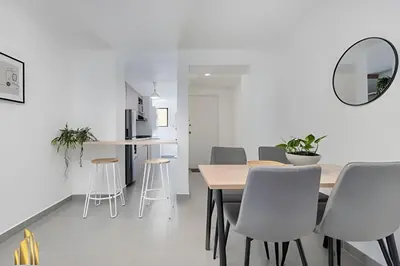 a kitchen and dining room with a table and chairs at Ankara 301 - Contemporary Loft Trendy in provenza in El Poblado