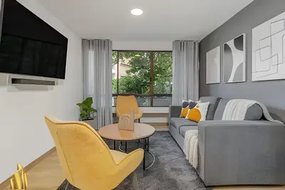 a living room with a couch and a table at Ankara 302 - Clean Comfy Loft Trendy in Provenza in El Poblado