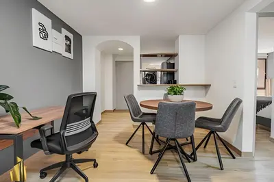 a kitchen and dining room with a table and chairs at Ankara 302 - Clean Comfy Loft Trendy in Provenza in El Poblado