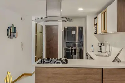 a kitchen with a stove top in a kitchen at Ankara 402 - Private bright apt/ Provenza in El Poblado