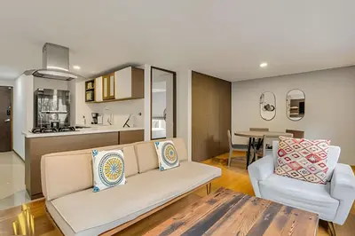 a living room with a couch and a table at Ankara 402 - Private bright apt/ Provenza in El Poblado