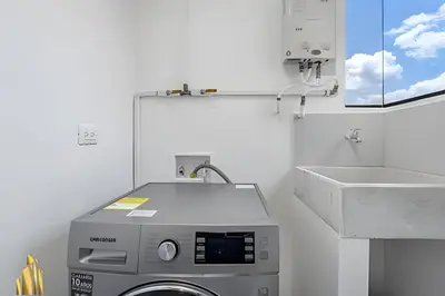a washing machine in a bathroom with a sink at Ankara 602 - Private clean & bright Apt with AC in El Poblado