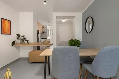 a kitchen and dining room with a table and chairs at Ankara 701 - Contemporary clean loft/ Provenza in El Poblado