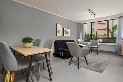 a living room with a table and chairs at Ankara 701 - Contemporary clean loft/ Provenza in El Poblado