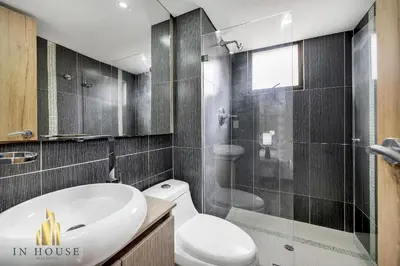 a bathroom with a sink and a toilet and a shower at Ankara 702 - Sophisticated & clean apt in Provenza in El Poblado