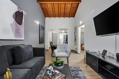 a living room with a couch and a tv at Ankara 802 - Secure & Private apt/ Trendy Provenza in El Poblado