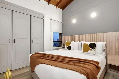 a bedroom with a large bed and a window at Ankara 802 - Secure & Private apt/ Trendy Provenza in El Poblado