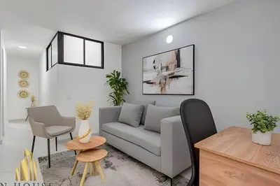 a living room with a couch and a table at Aria Living 301 - Total Exclusivity in Laureles in Guayaquil