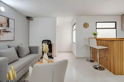 a living room with a couch and a table at Aria Living 301 - Total Exclusivity in Laureles in Guayaquil