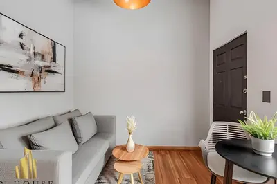 a living room with a couch and a table at Aria Living 501 - Design and Perfect Location in Guayaquil