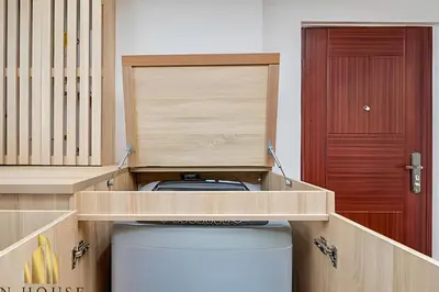 a room with a toilet in a room with a door at Aria Living 502 - Luxury Terrace in Laureles in Guayaquil