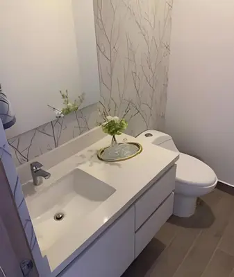 a bathroom with a white sink and a toilet at Campestre 605 - Cozy Studio with AC and Balcony in Envigado