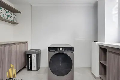 a washer and dryer sitting in a room at Caracolí 301 - Donde el Estilo Grita Libertad in El Poblado