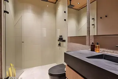 a bathroom with a shower with a toilet and a sink at Casa Biflora - Natural luxury in top location in El Poblado