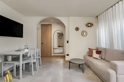 a living room with a couch and a table at Casa Solei 12-3 - Prime Location: Enjoy El Poblado in El Poblado