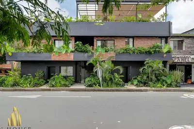 a building with plants on the side of it at Casa Solei 12-3 - Prime Location: Enjoy El Poblado in El Poblado