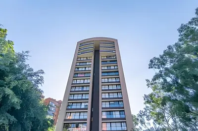 a tall building with trees in front of it at Class Suites 502 - Modern Tranquility/Priv Balcony in El Poblado