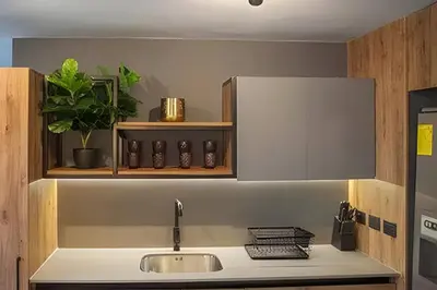 a kitchen counter with a sink and a cabinet at Condado 204 - Eco Apt/Natural Atmosphere in El Poblado